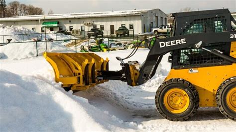 snow plow with skid steer